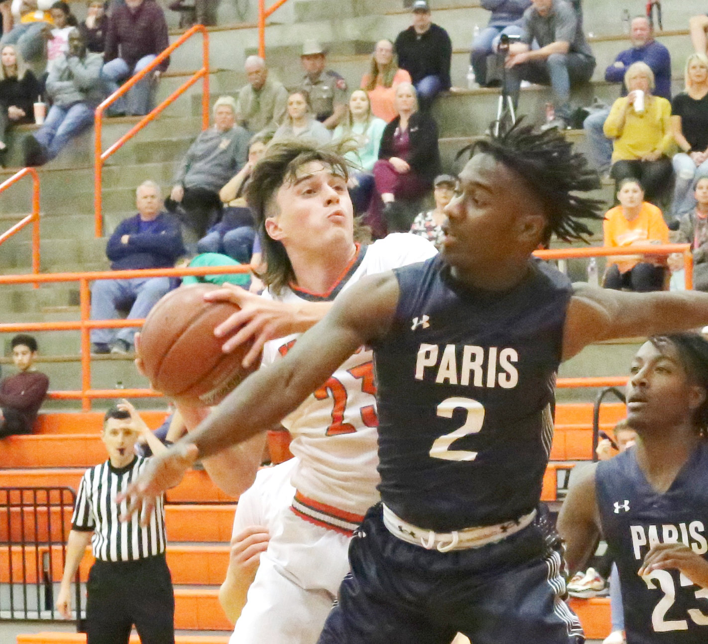Senior Yellowjacket Wiley Franks pulls down a rebound in a crowd against Paris. (Monitor photo by John Arbter)